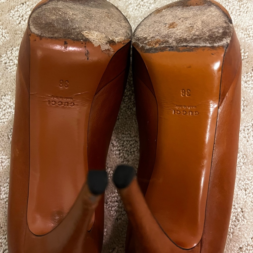 A pair of Gucci shoes